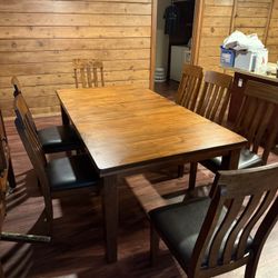 Ralene Dining Table and 8 Chairs with Storage