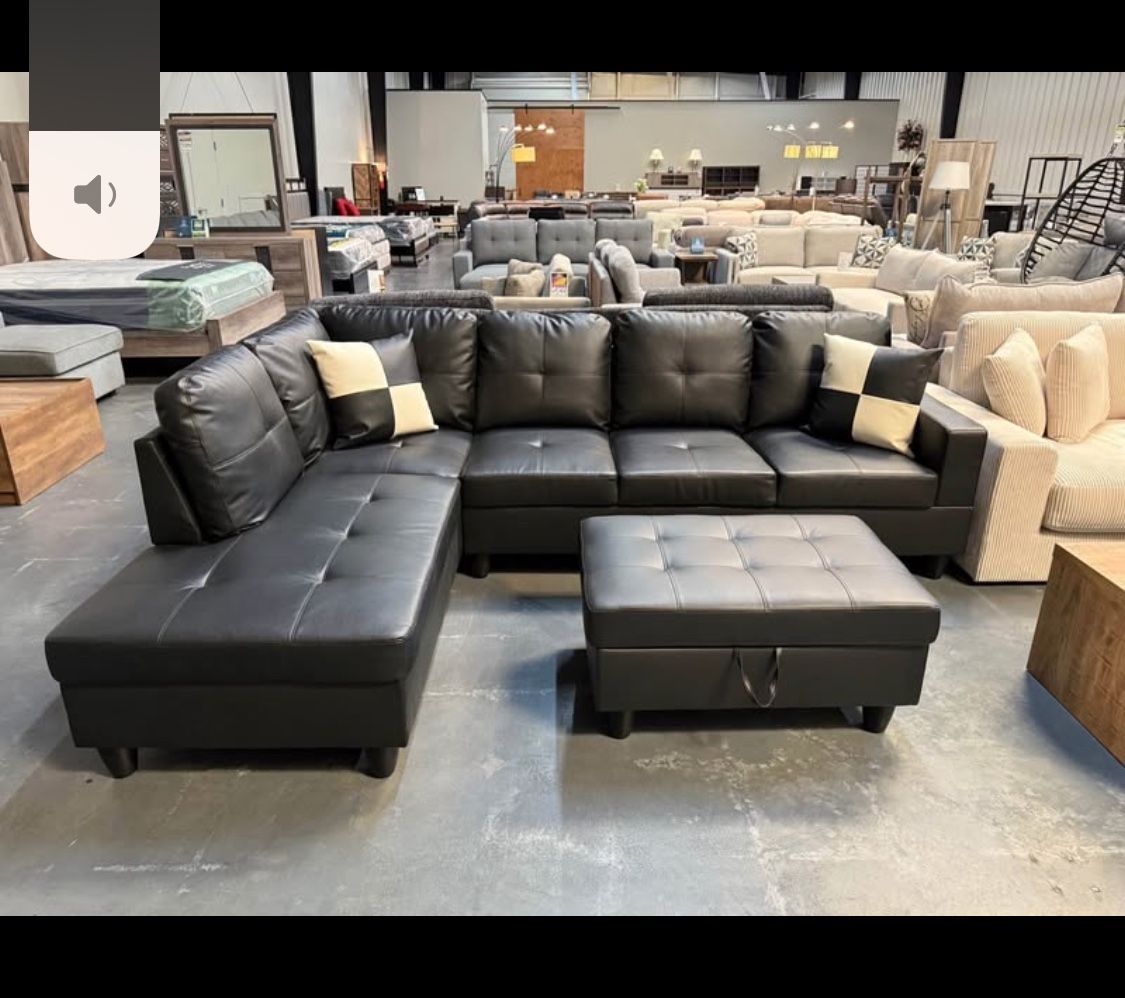 Black Vinyl Sectional With FREE OTTOMAN