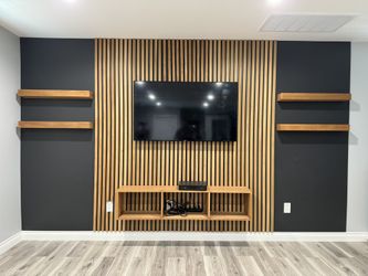 Vertical Slat Accent Wall With Four Shelves