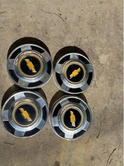 1974 and 1977 Chevy C 10 OG hubcaps