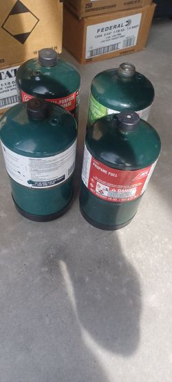 4 full Coleman propane tanks 15 for all four