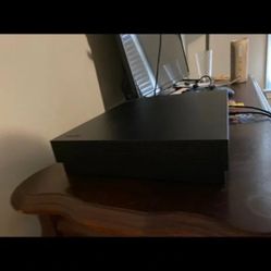 Xbox One X Mint condition Less than a year old 1TB