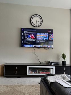 58 inch Roku smart tv and el dorado tv stand