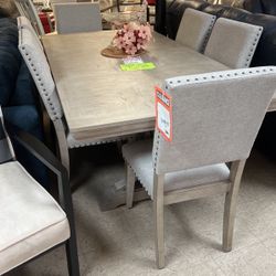 Table and four chairs 1199 table and six chairs 1499 brand new