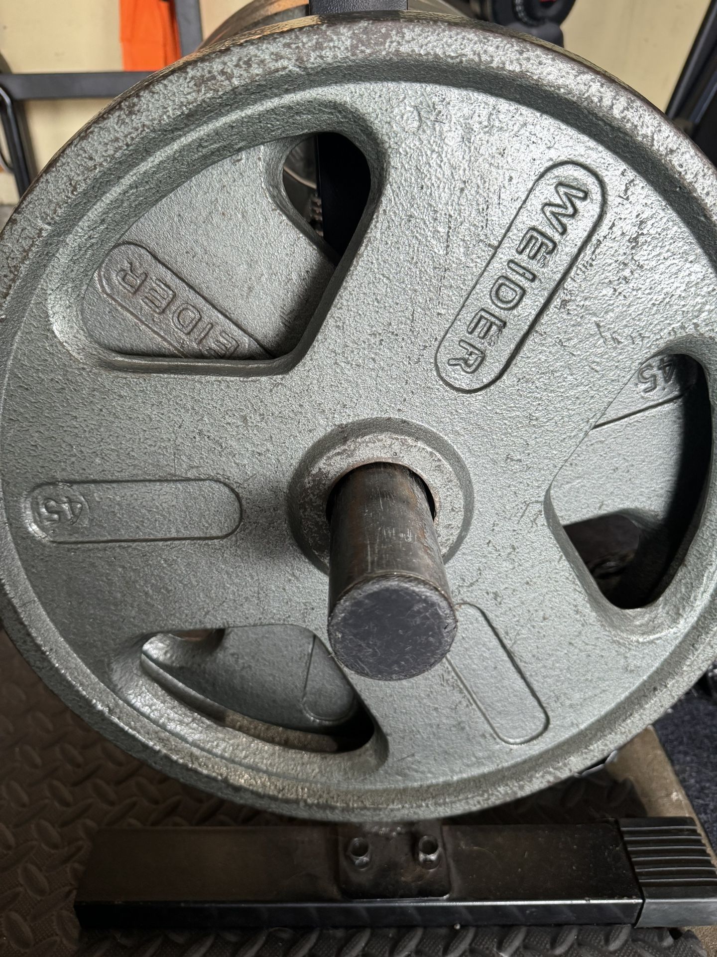 A Sets Of 45 Pound Olympic Weights