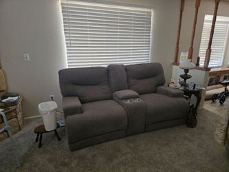 2 reclining chairs and canbinet