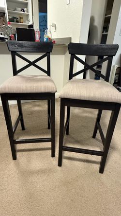 2 Brown counter stools