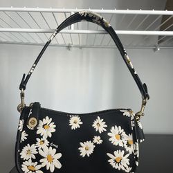 Coach side purse with flower print 