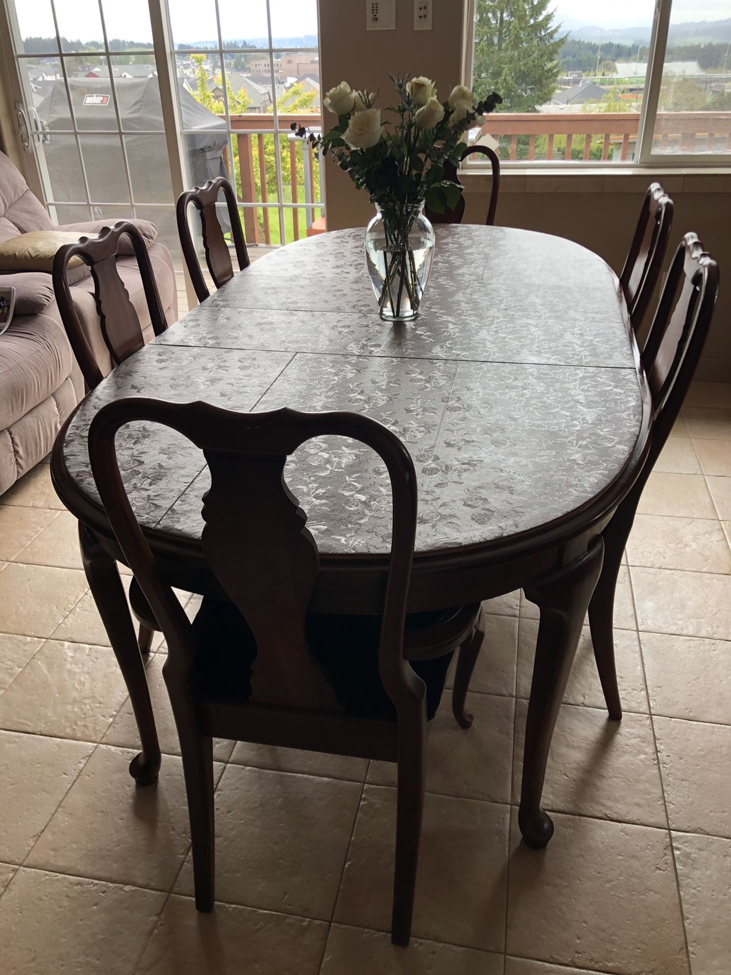 Dining room table with six chairs two leaves and table covers very nice