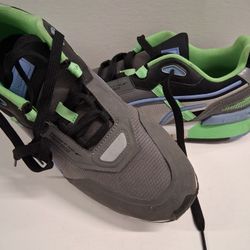 Puma Mirage Tech sneakers in the Castlerock/Elektro Green colorway. 