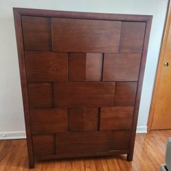 Tall Wood Dresser with Geometric Panel Design