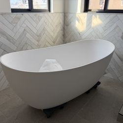 Freestanding White Stone Tub