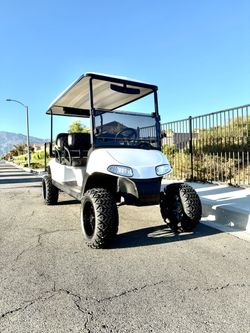 EZGO RXV 6 - SEATER LIFTED / LITHIUM GOLF CART