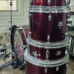 5 Piece drum kit with cymbals.