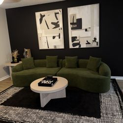 Couch And Bed With Pics On The Wall 