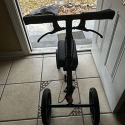 Pink scooter and red boy bike