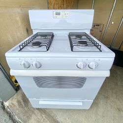 Whirlpool gas stove 4 burners white color  30”