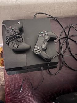 PS4 with games and 2 controllers