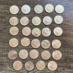 Lot of 29 Kennedy Silver Half Dollars
