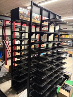 One Cigarettes display rack with pushers, and light signs