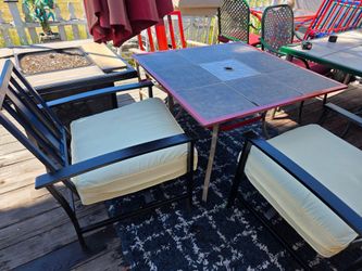 Vintage hampton bay 3 chairs  rocker with cusion nice table with tile and hsmpton bay firepit    2 tile neef replacement but its working