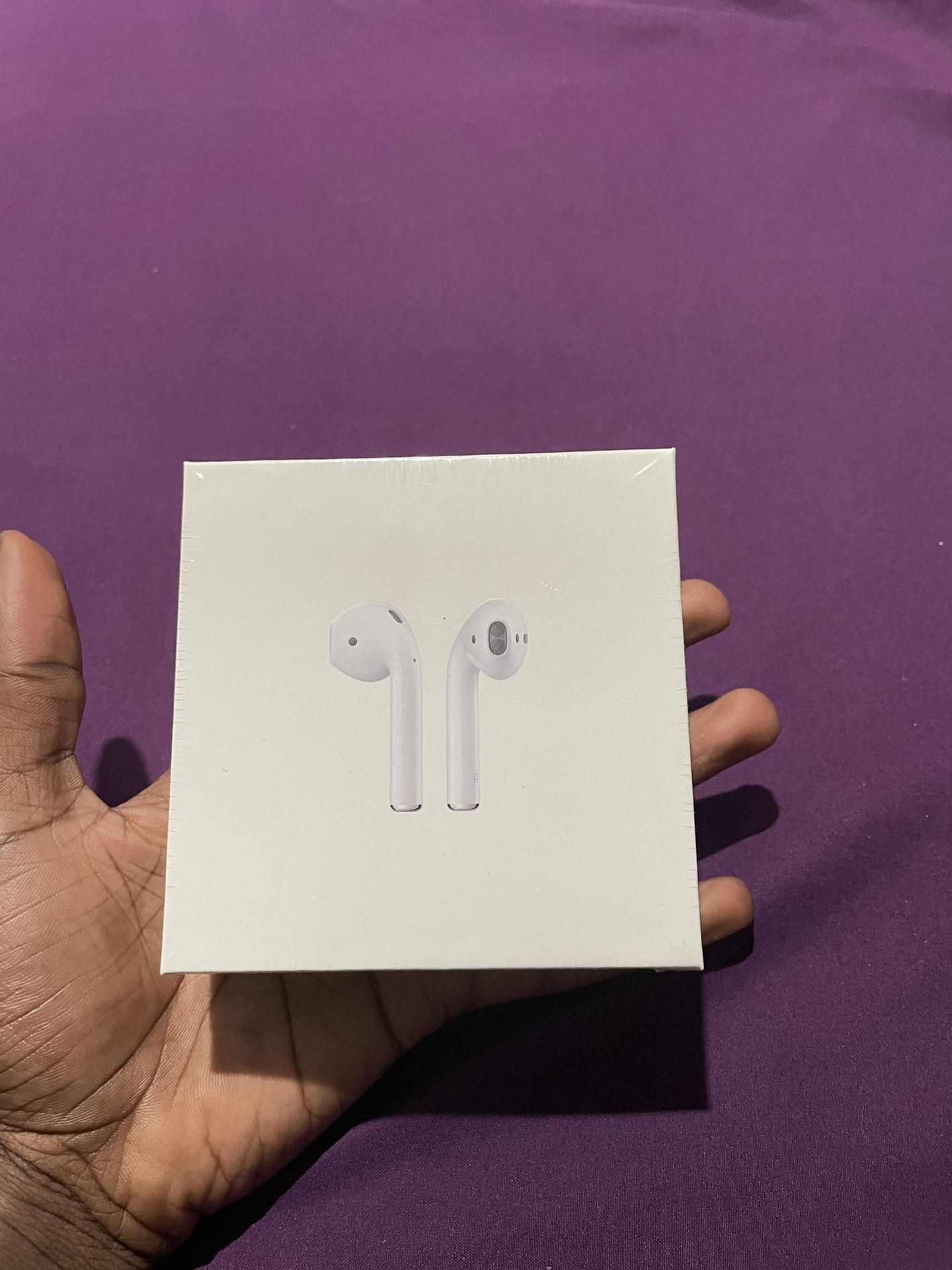 Apple AirPods (2nd Generation) with charging case