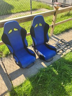 Cloth bucket seats with floor mount brackets. Very good condition, $250.00 or BO