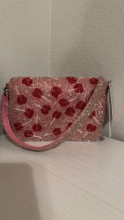 Beaded bag crafted in India $25