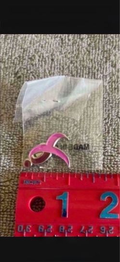 12 BREAST CANCER AWARENESS PINK RIBBON MAGNET PINS. SEE PICS FOR SIZE. YOU CAN WEAR OR PUT ON ANY METAL OBJECT THAT TAKES MAGNETS