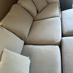 Couches And 2 Ottomans 