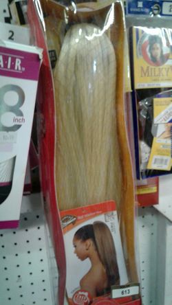 Draw strings ponytails all different colors and textures,can be curled,straighten