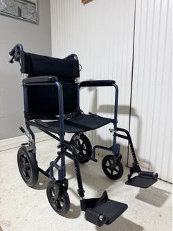 Transport wheelchair, silla de transporte