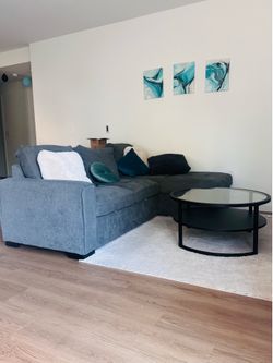 Sofa cum bed available - used mint new plus the round sofa table