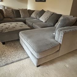 Gray Sectional With Ottoman