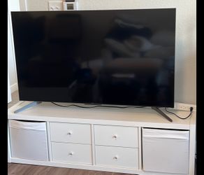 55” 4k TCL Tv / 1x4 storage cabinet