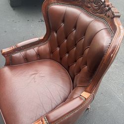 Vintage Rococo Design carved wood and leather armchair