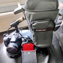 professional digital camera,with multiples accesorios,every thing you see in the pictures