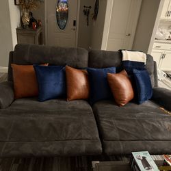 Two Gray  Sofas Fabric  Material. 