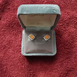 Fire opal and diamond fashion earrings.