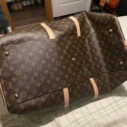 The Louis Vuitton Keepall M4y1412  customizable travel bag 