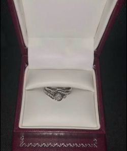 10k White gold 1/3CTW diamond ring with 10k white gold bypass band.