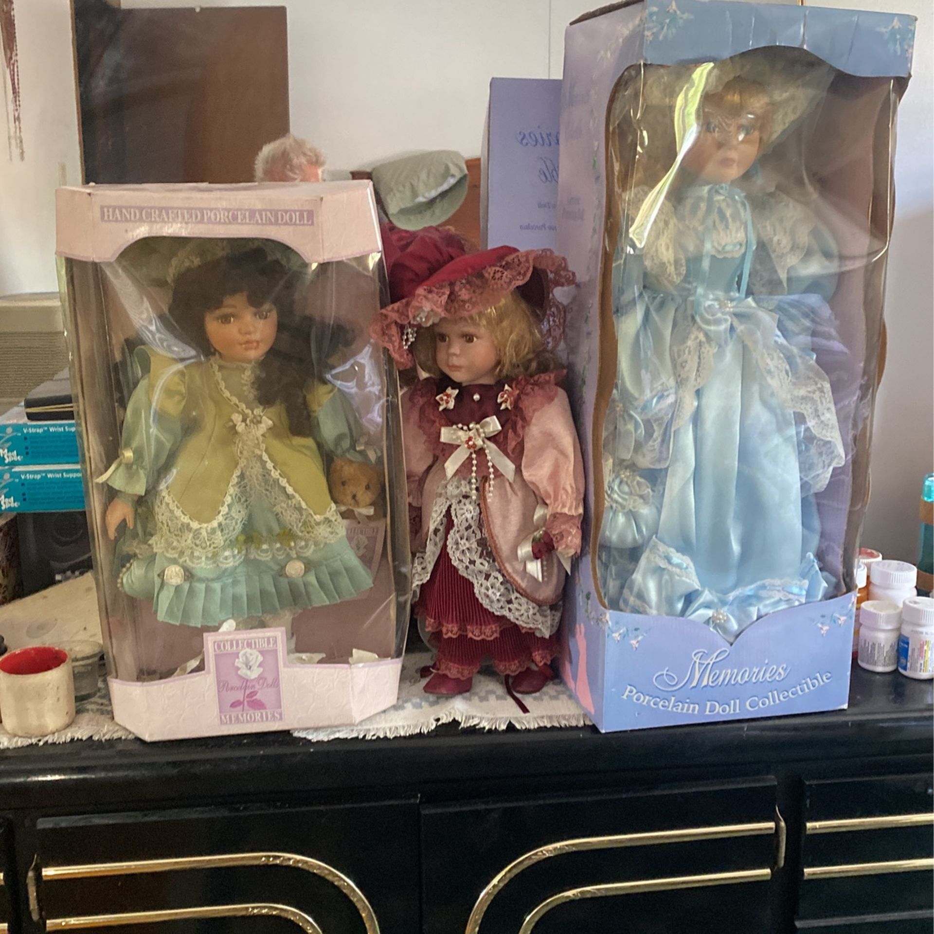 3 porcelain dolls