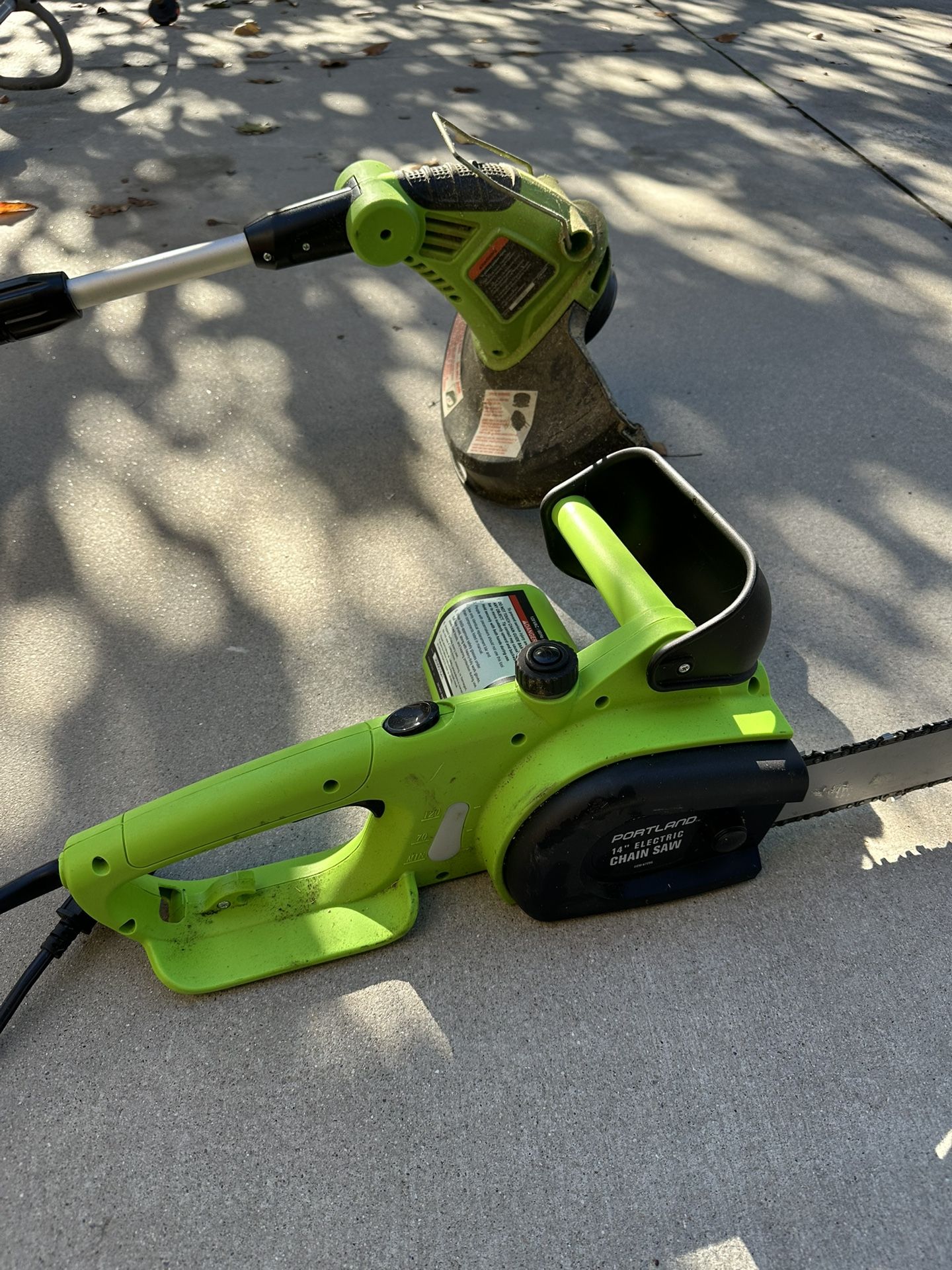 Electric Chain Saw And Weed Wacker. 