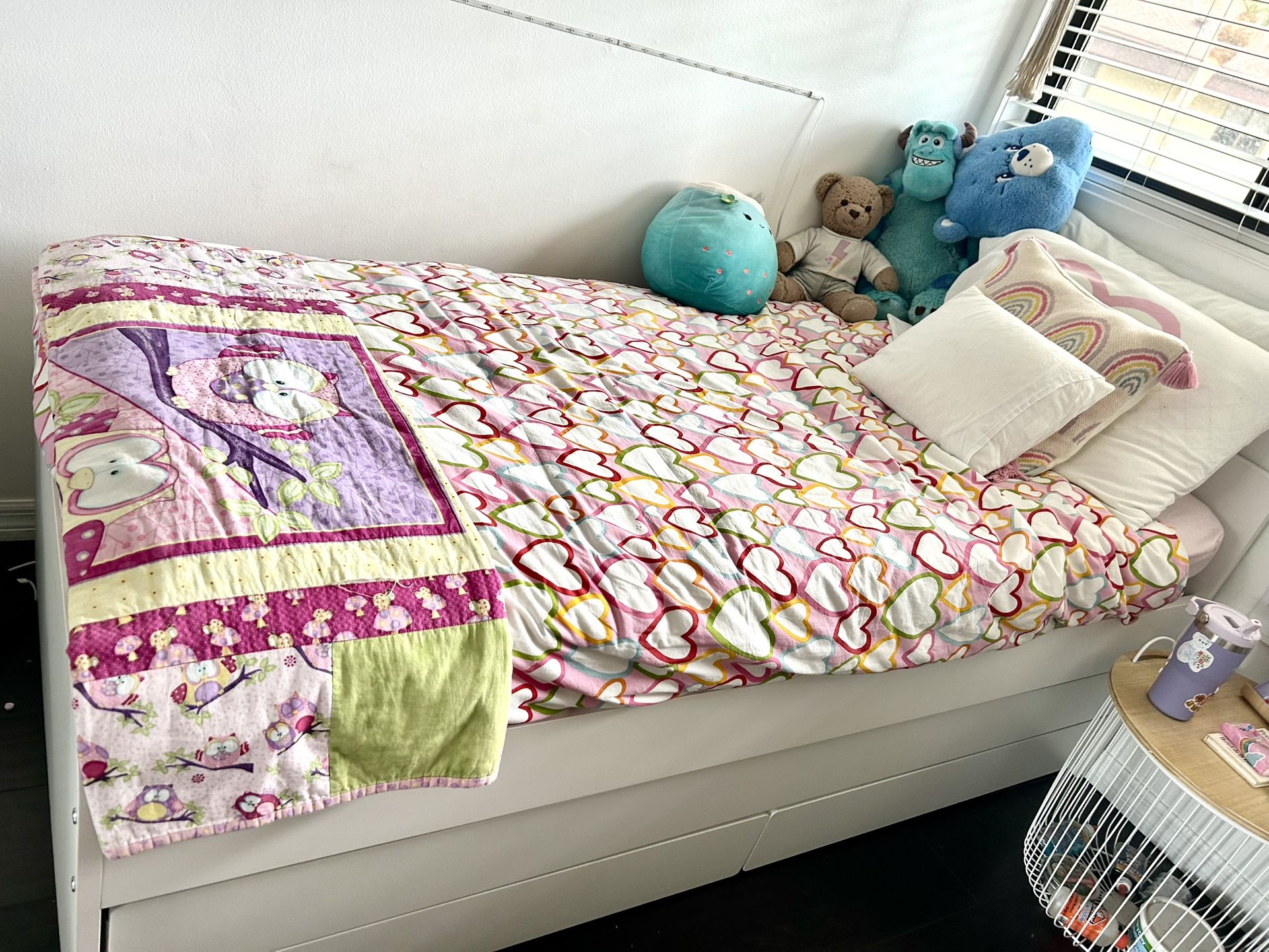Twin Size Bed With Extra Bottom Mattress And White Shelves