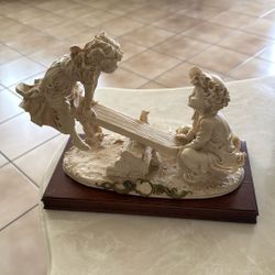 Swings Boy And Girls By Austin Sculpture 1 Feet Wide By 9 Inches Tall 