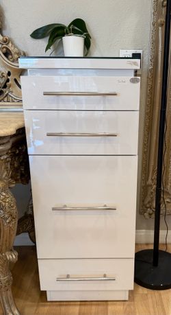 Cabinet for a hair stylist.