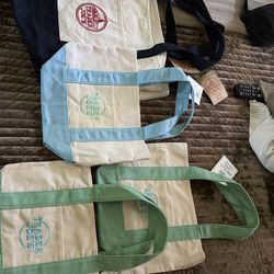 Trader Joe’s totes bags … mini $12…..big tote $20