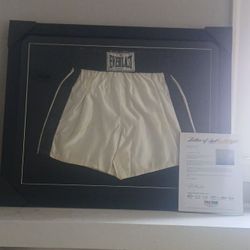 Muhammad Ali Psa DNA Autographed boxing trunks framed and matted