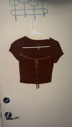 brown top with satin bow