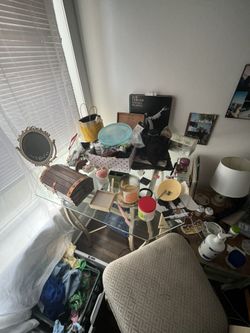 Glass bistro table with matching set of chairs